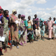 Pregnant women lining up for a food distribution at the UN refugee camp in Bentiu.